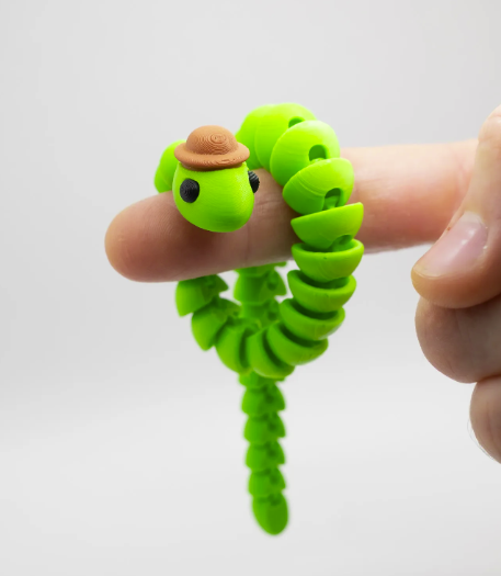 Meet Mr. Snek — the bendy, twisty little troublemaker who’s always ready to hang out!